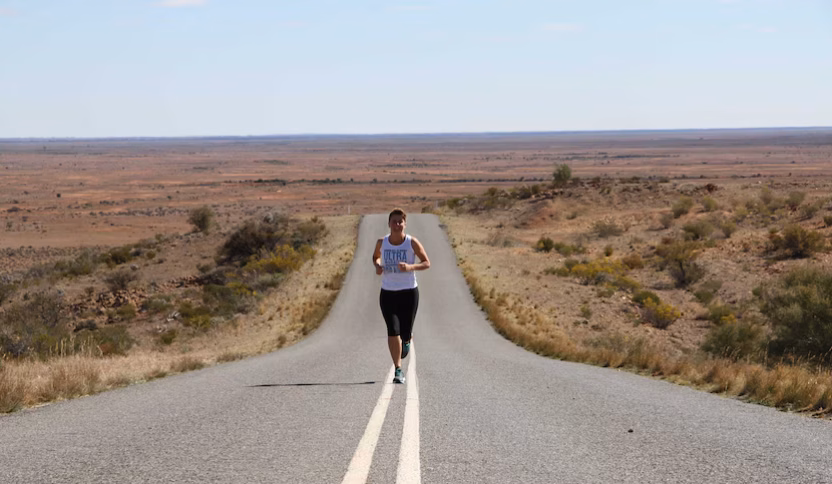 Kirrily ran 1300km from Broken Hill to Sydney to help end family violence. Now anyone can join her virtually.